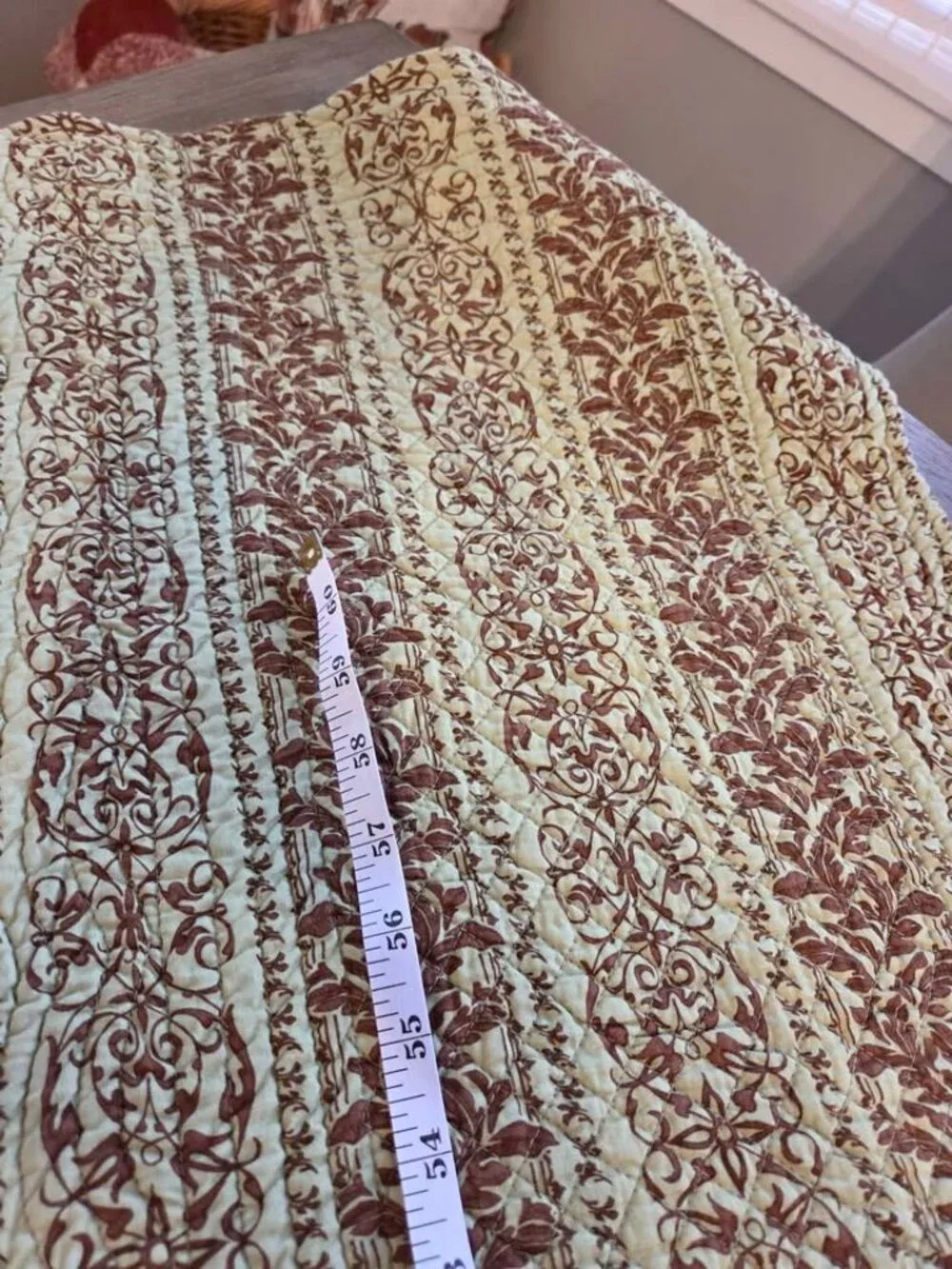 Brown and green quilted table runner